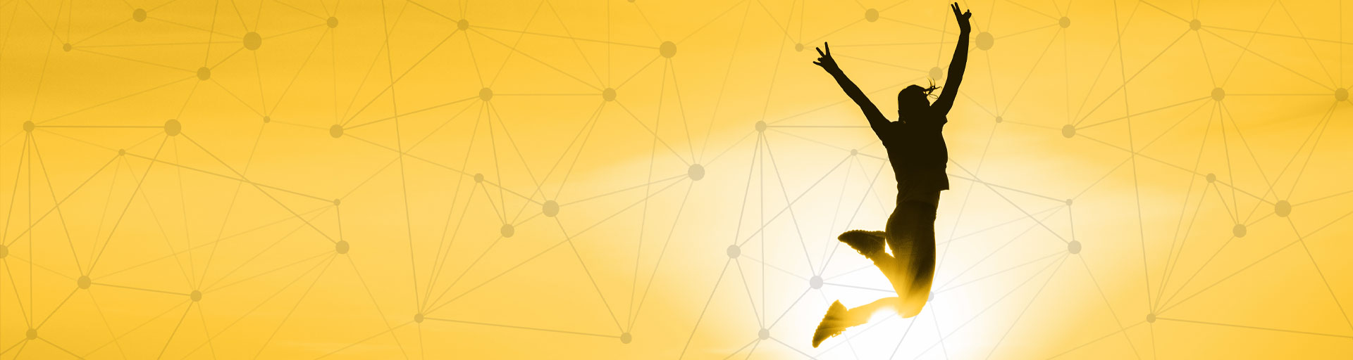 Silhouette of student jumping on a gold background